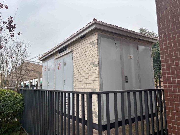 Outdoor substation with brick-patterned enclosure