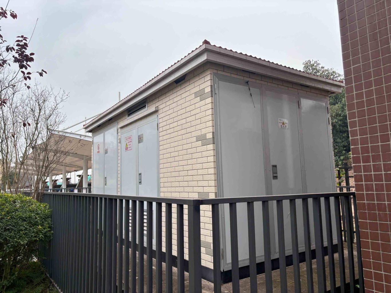 Outdoor substation with brick-patterned enclosure