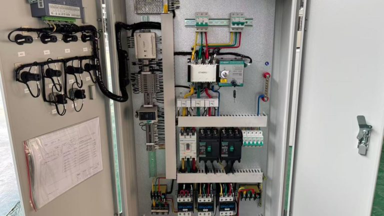 industrial electrical control panel with internal components