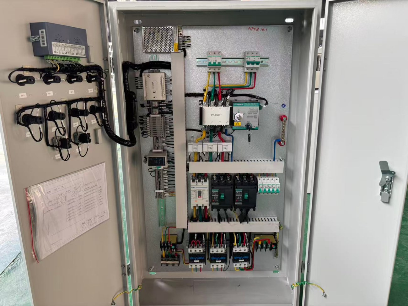 industrial electrical control panel with internal components