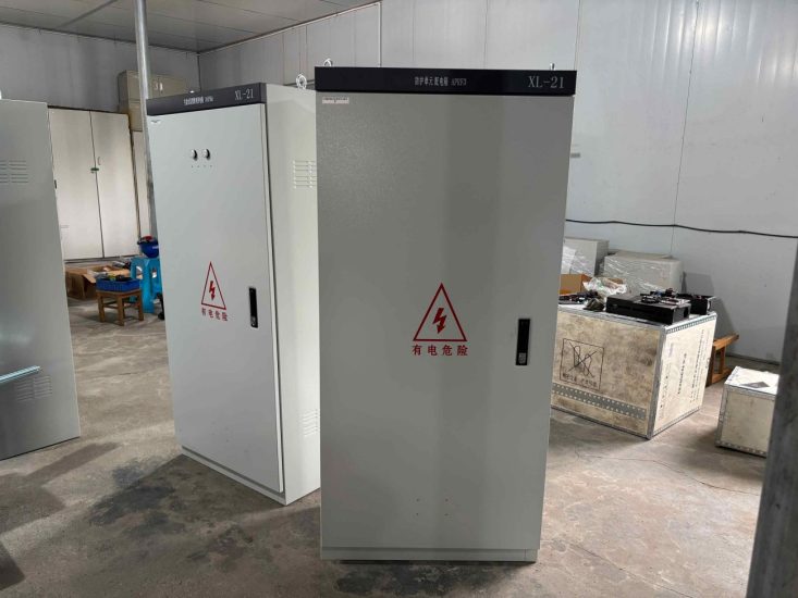 two power distribution cabinets in workshop