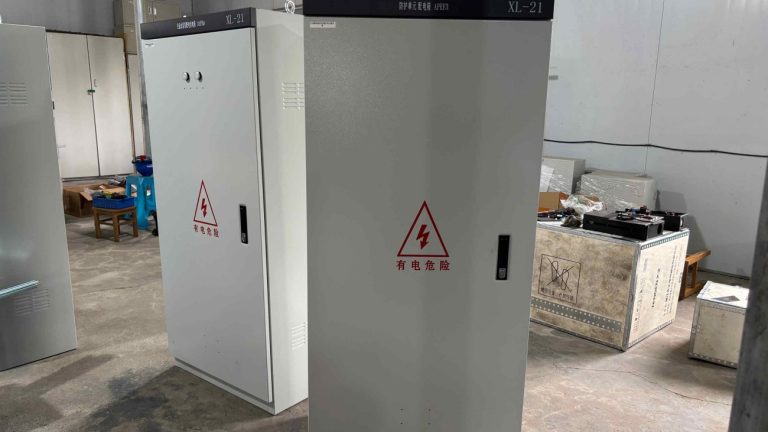 two power distribution cabinets in workshop